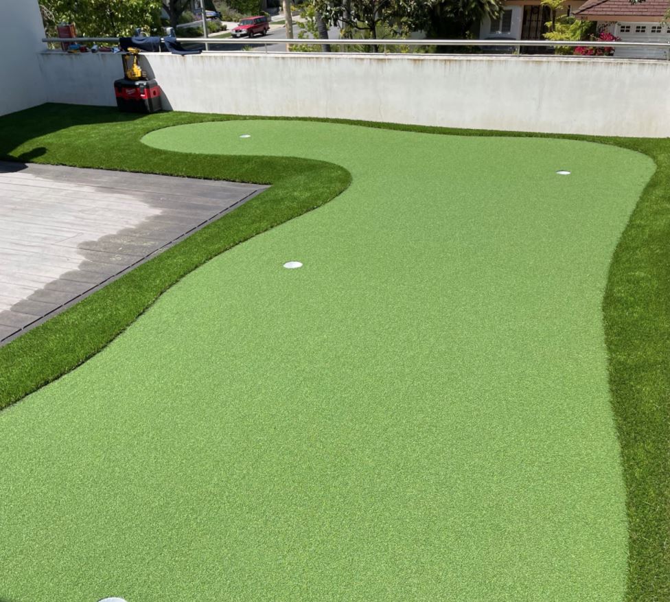 Dennis B. rooftop putting green — Newport Beach