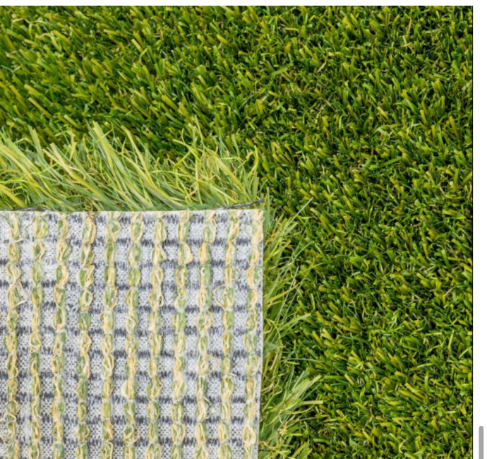 Lush artificial turf — blade and backing detail